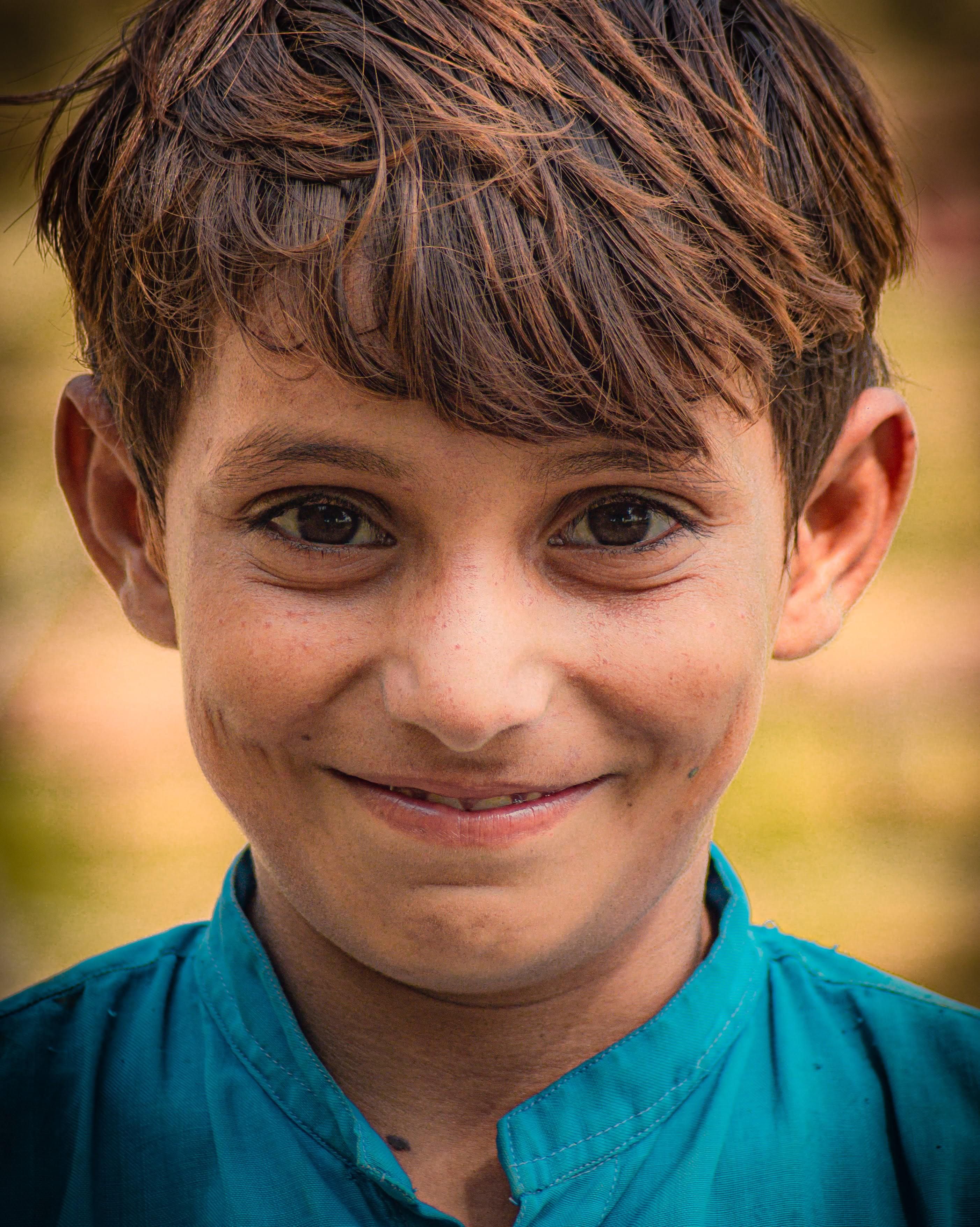 Portrait of a Smiling Boy in Padidan · Free Stock Photo