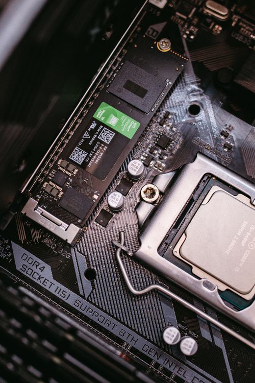 Do I Remove Sticker from M.2? (2026 Complete Guide) 3 Computer motherboard with CPU and M.2 SSD installed
