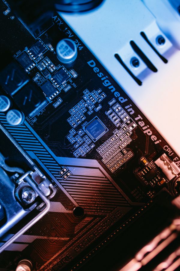 Macro shot of a circuit board and processor chips — photo by Jonathan Borba on Pexels