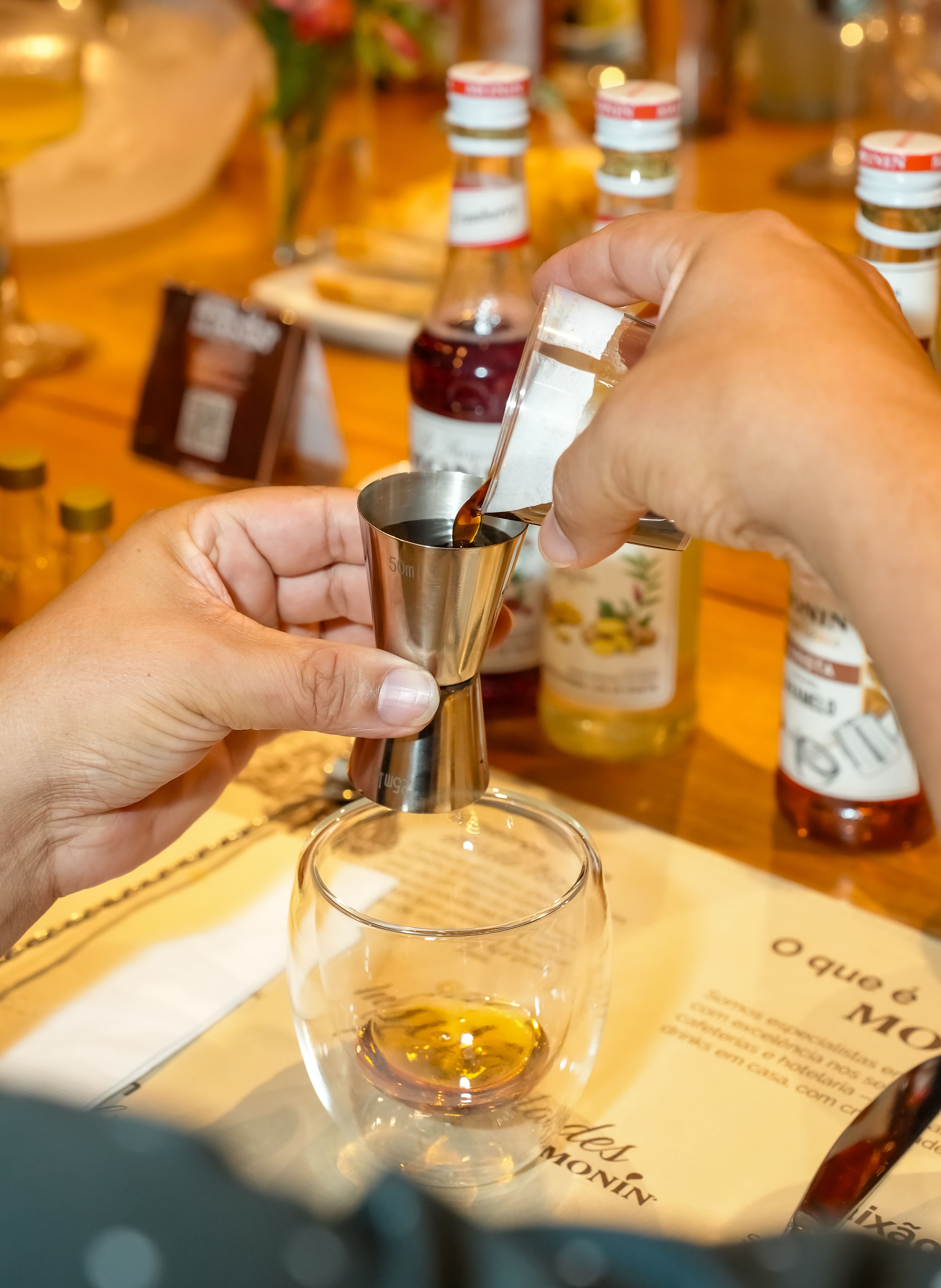 Mixologist Preparing a Cocktail with Precision · Free Stock Photo