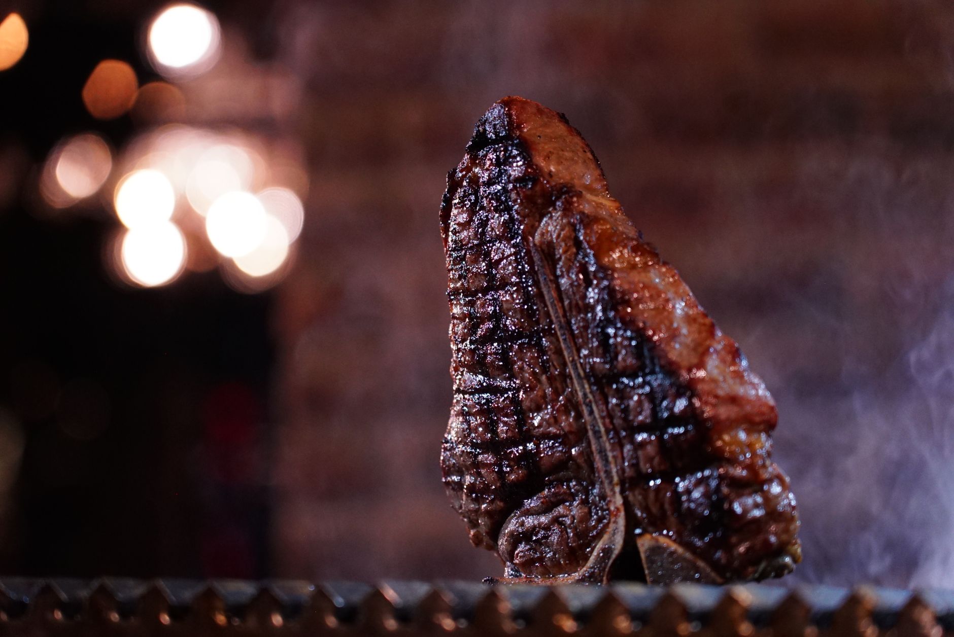 Classic steak served with fresh herbs and sides