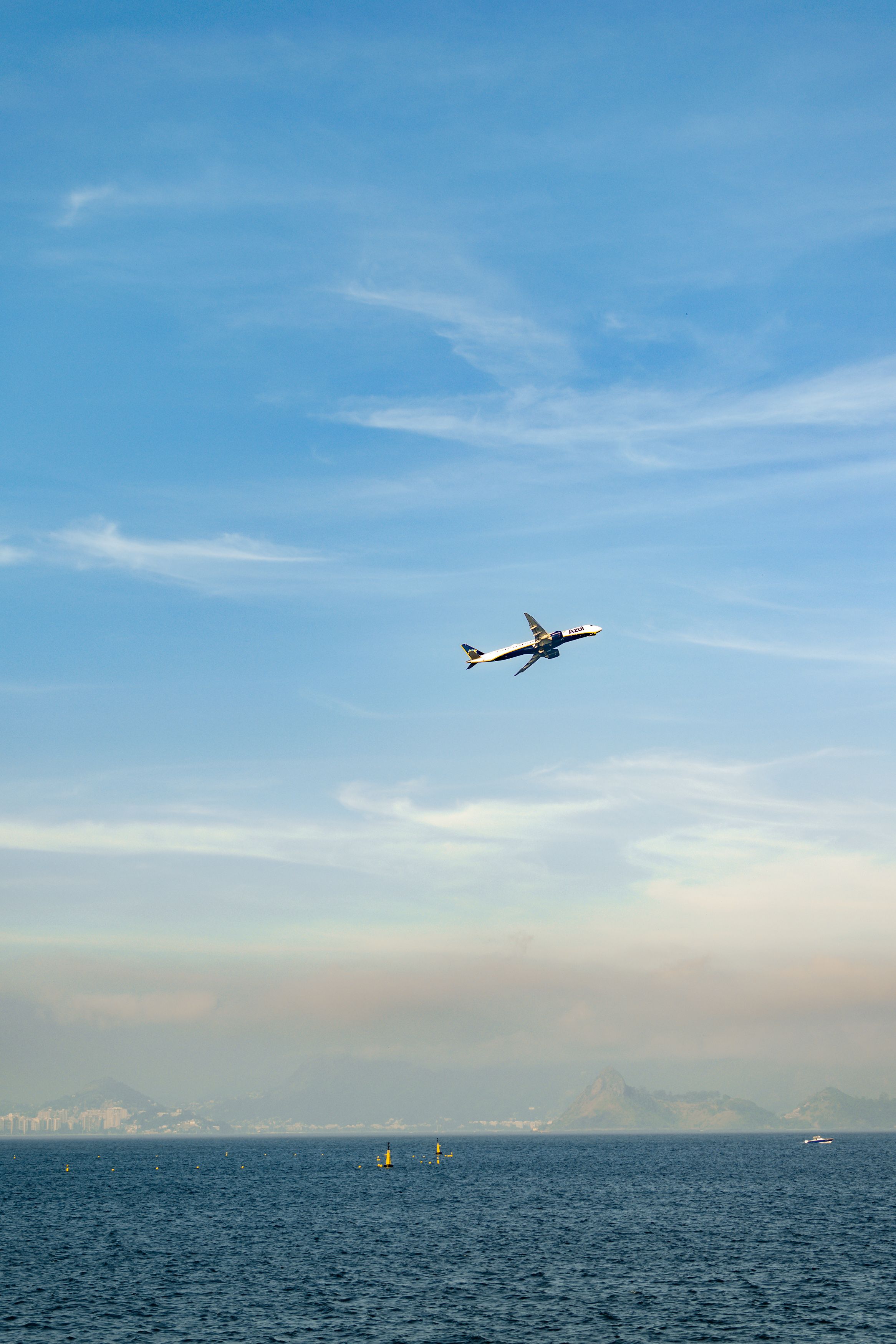 Airplane Flying Over the Ocean in Rio de Janeiro · Free Stock Photo