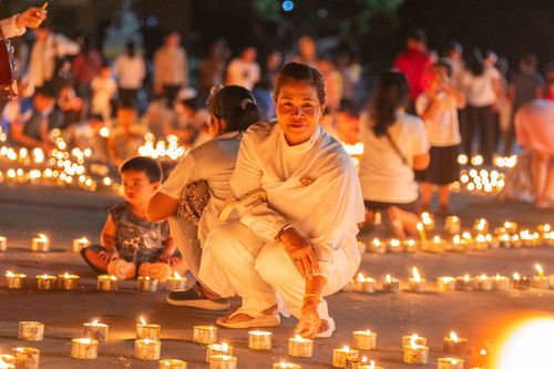 Free A candlelit gathering in Battambang, Cambodia, showcasing cultural celebration and community spirit. Stock Photo