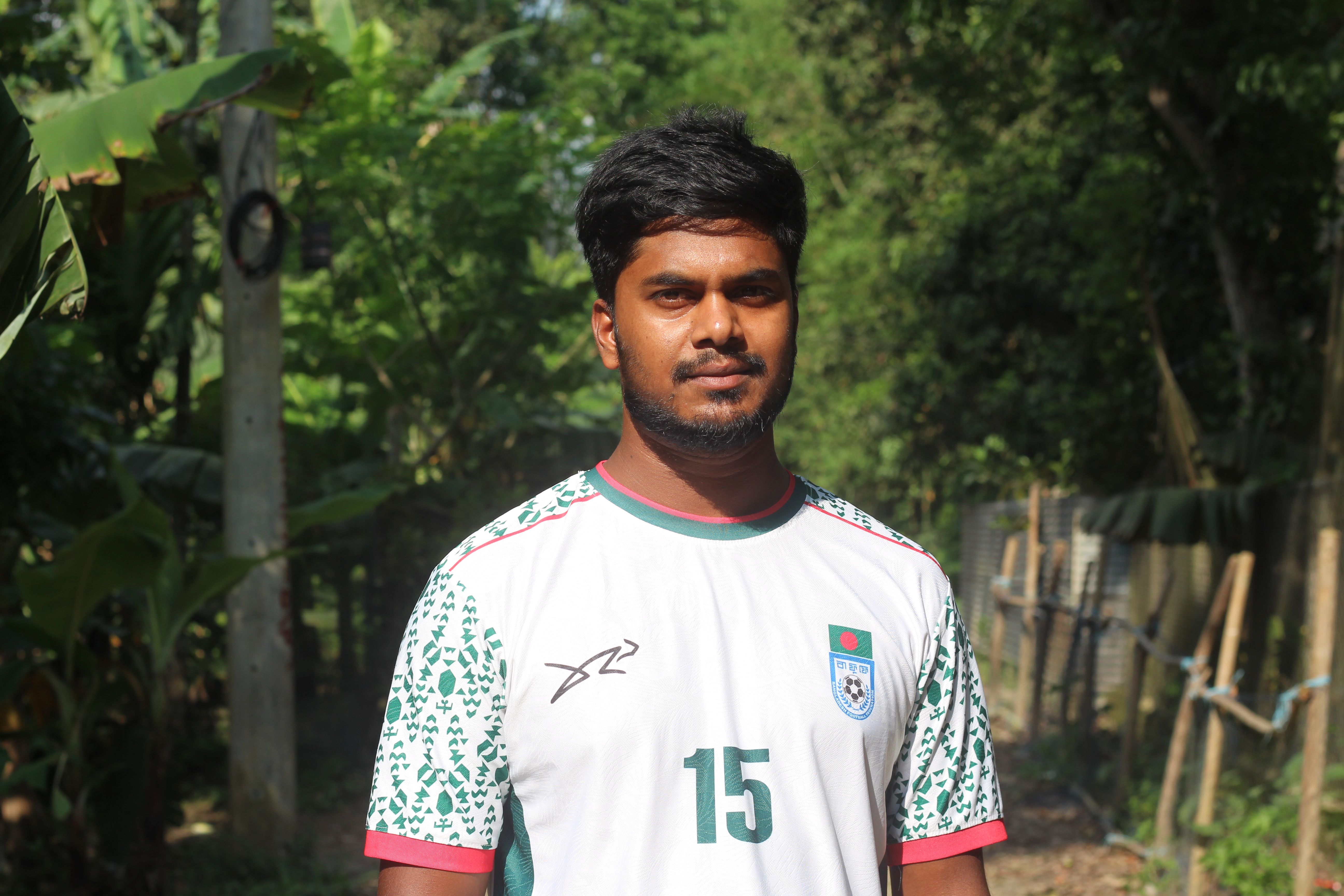 Portrait of a Young Man Outdoors in a Sports Jersey
