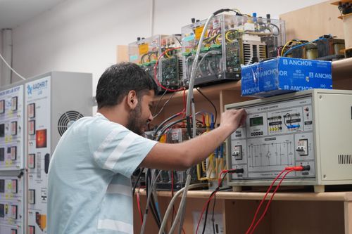 Engineer calibrating laboratory measurement equipment
