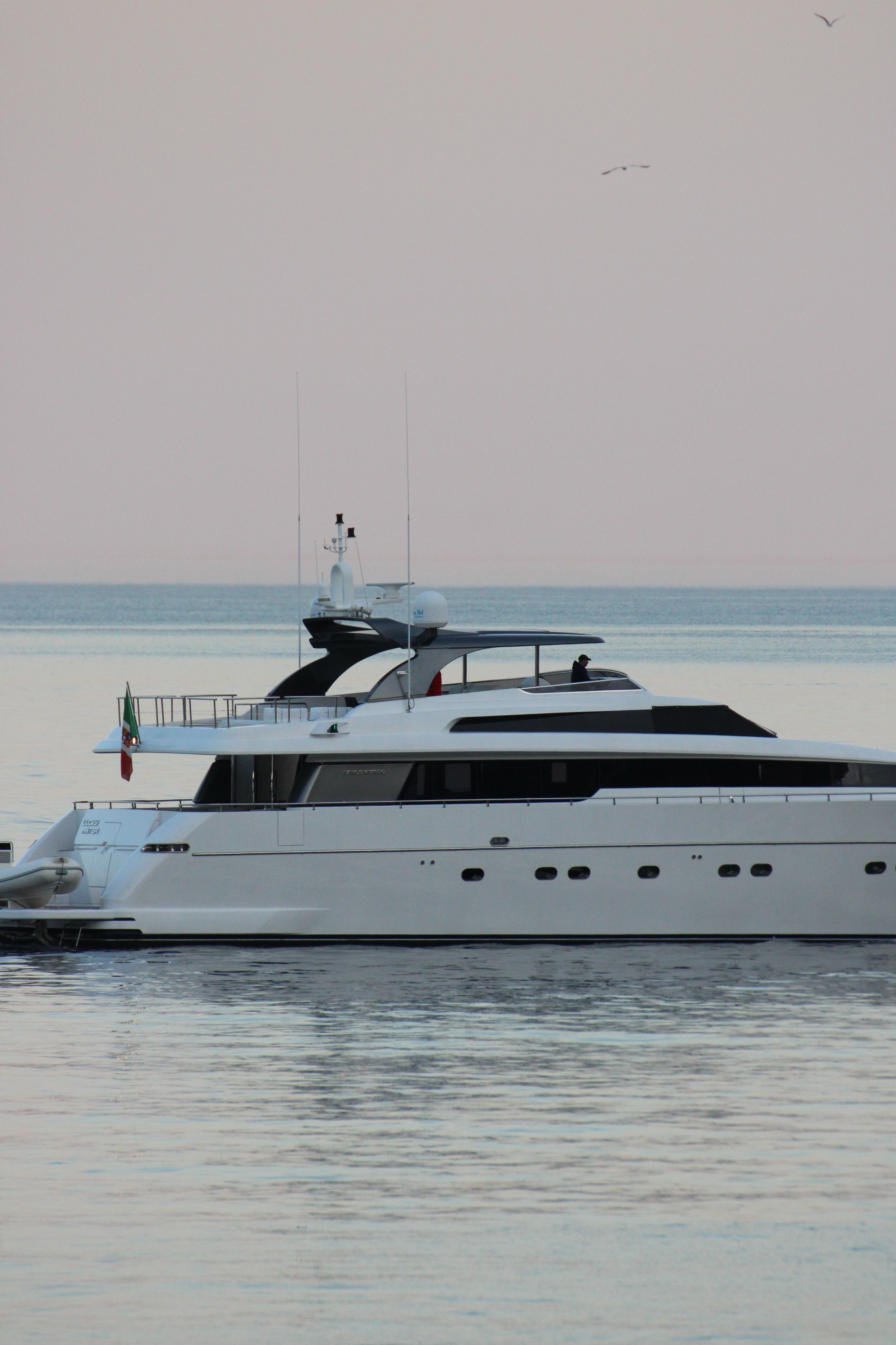 Luxury Yacht at Dusk in Portofino, Italy