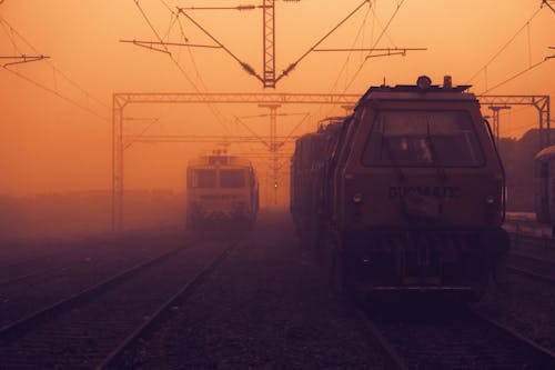 Kostnadsfri bild av kollektivtrafik, luftförorening, solnedgång