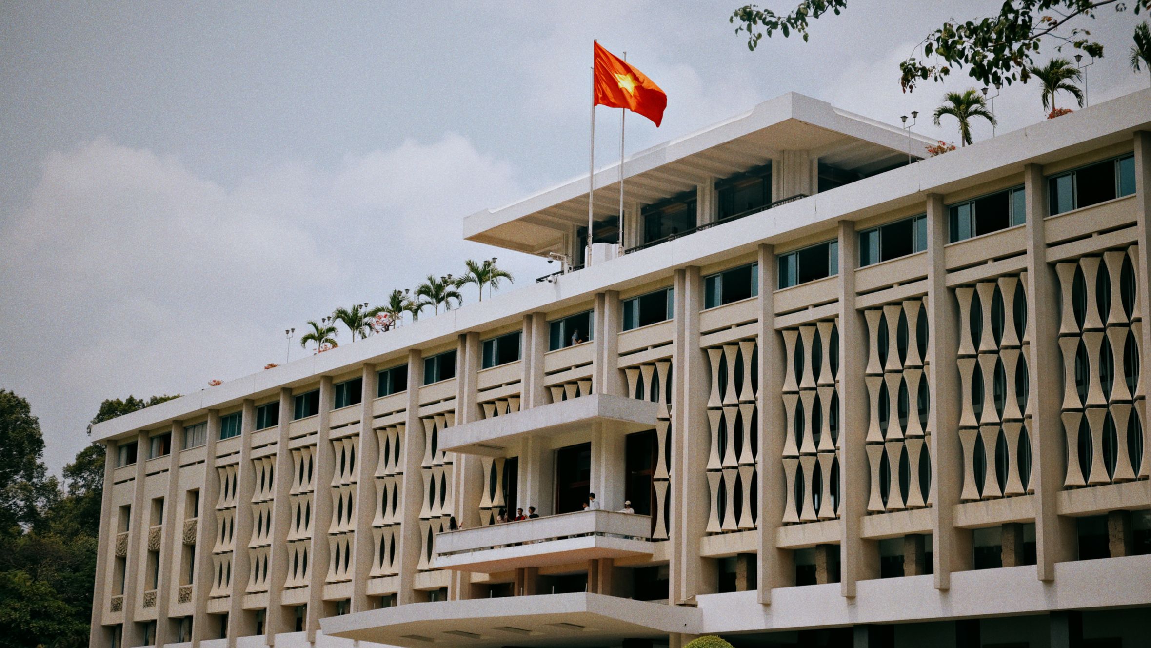 Explore the iconic Independence Palace with its modernist architecture in Ho Chi Minh City, Vietnam.