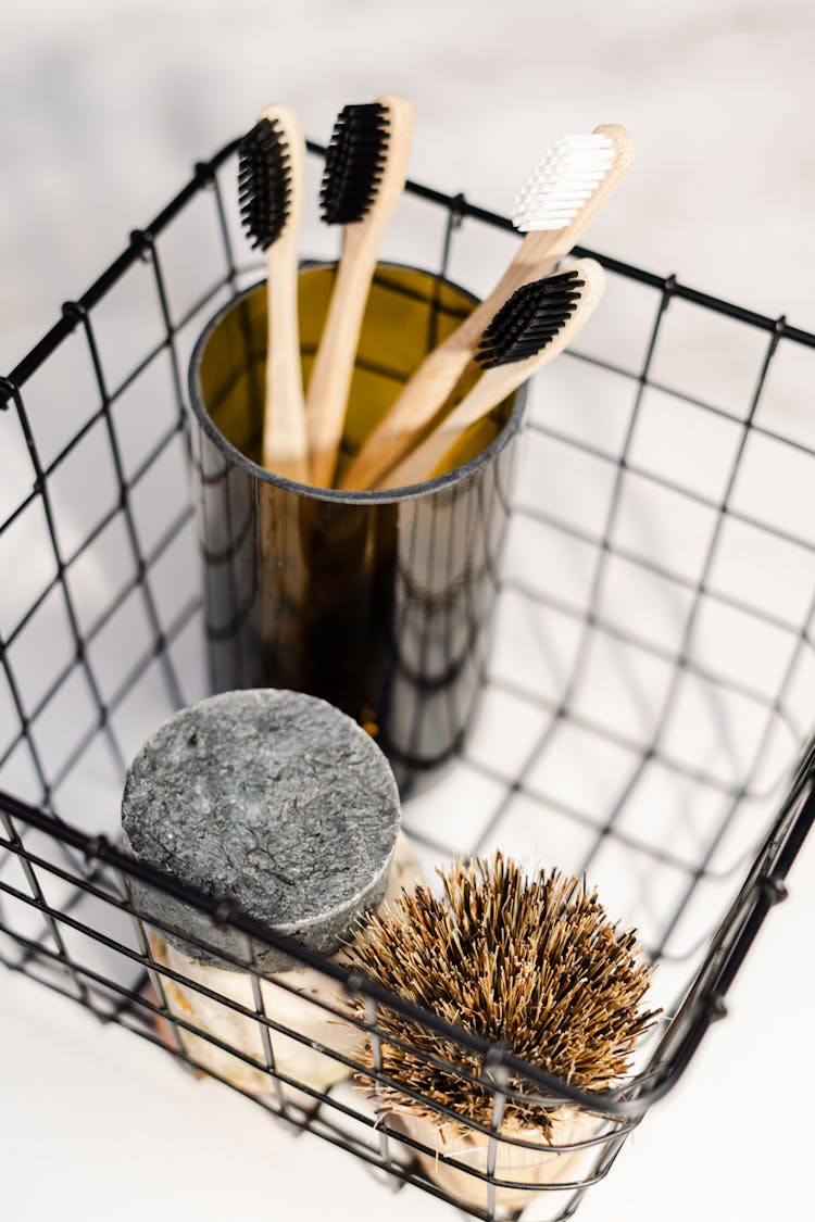 A Steel Basket With Toiletries