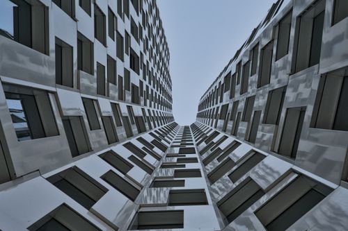 Free Modern architectural facade in Berlin with geometric patterns and symmetry. Stock Photo
