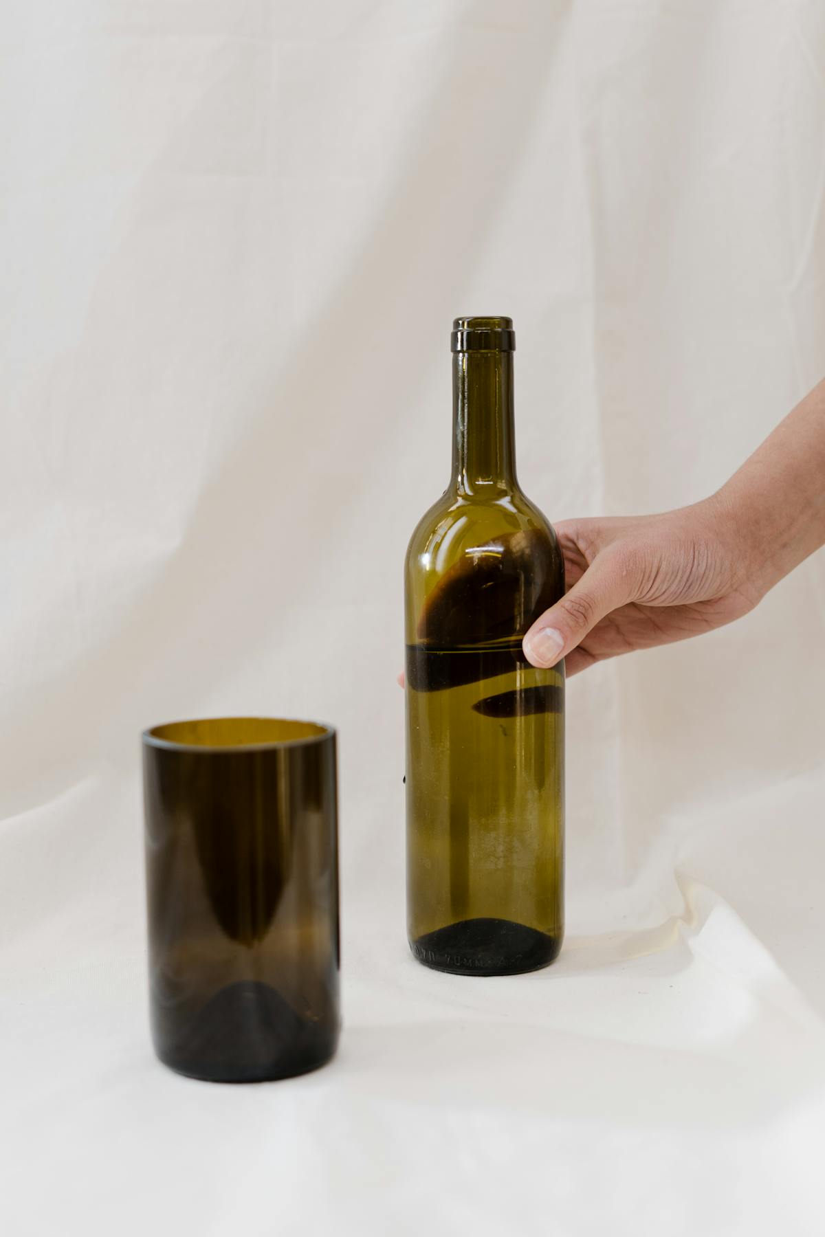 Person preparing a healthy meal with vegetables and fish