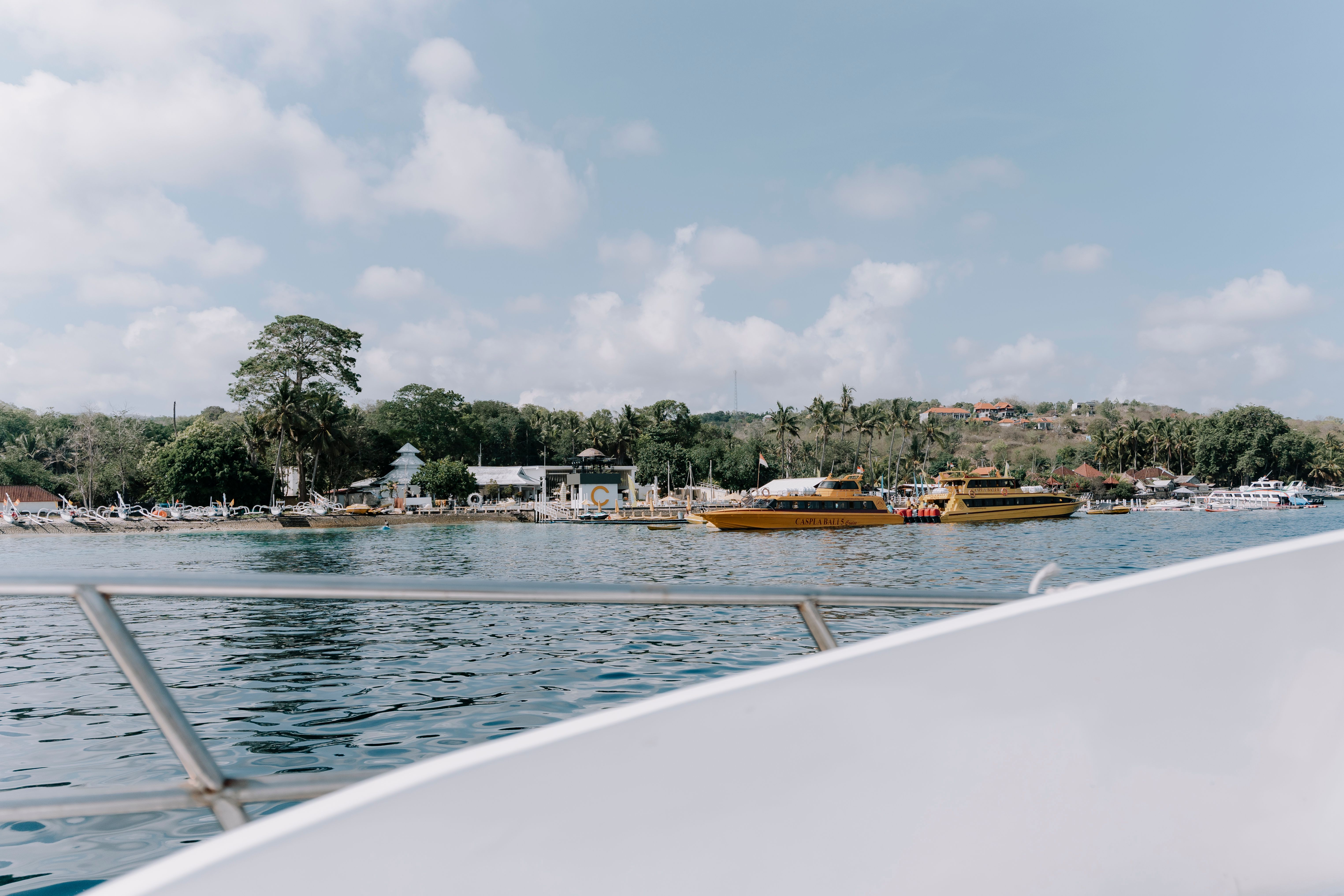 A fast boat carrying passengers between Bali and Nusa Lembongan, Indonesia