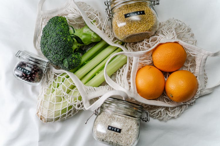 Orange Fruits In Mesh Bag