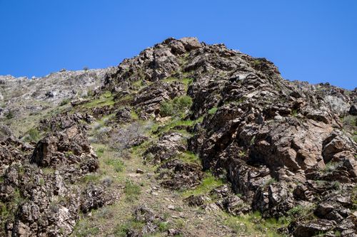 Free Stunning rocky hillside under a clear blue sky in Palu, Elazığ, Türkiye, showcasing rugged natural beauty. Stock Photo