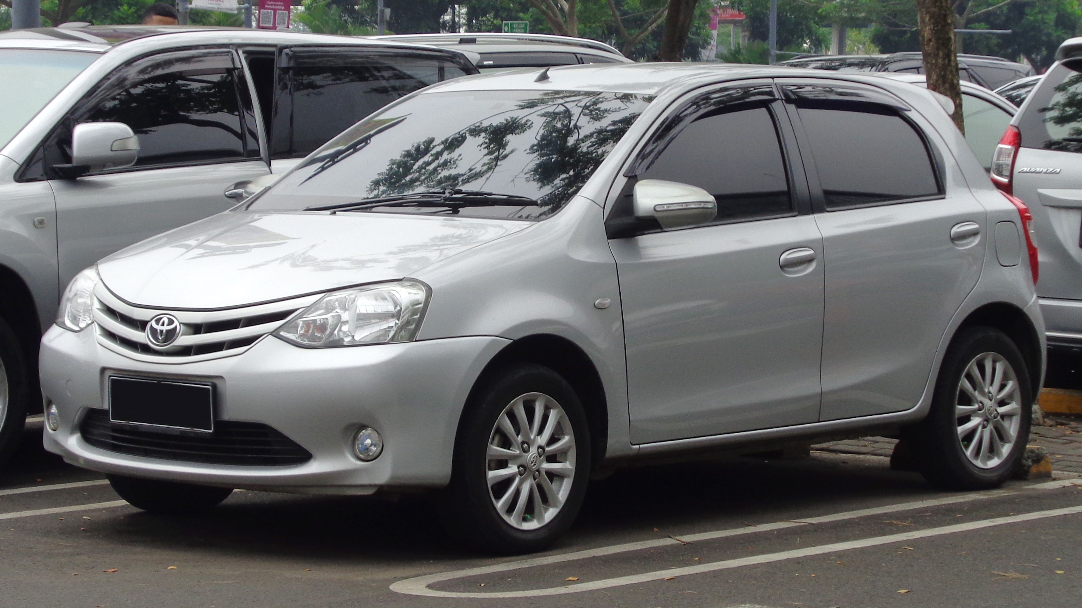 Vehicle parked near mountain viewpoint