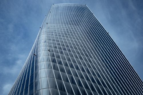 Free Impressive shot of a modern skyscraper in Milan, showcasing architectural elegance against a clear sky. Stock Photo