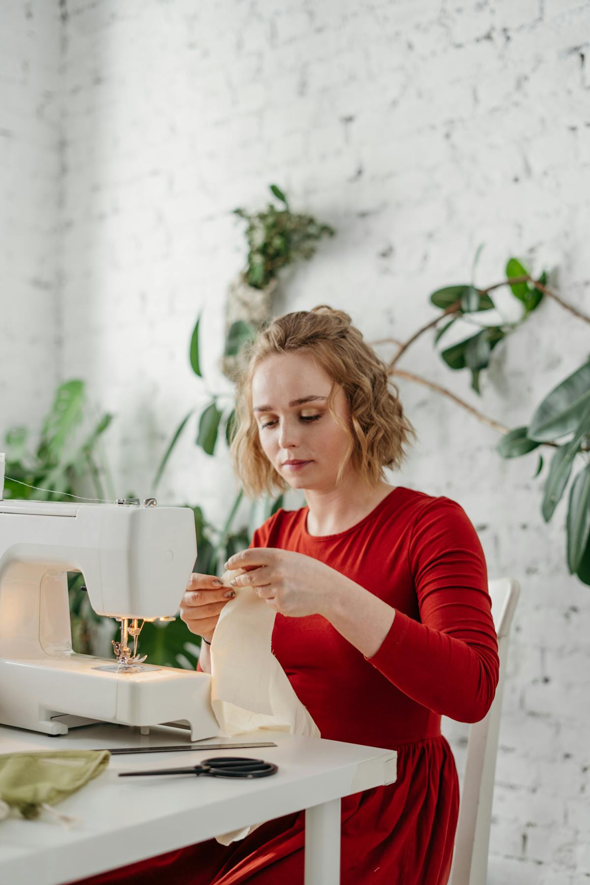 Minimalist wardrobe rail with a small selection of neutral clothing and reusable tote bag