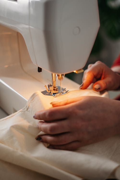 Person Using a Sewing Machine