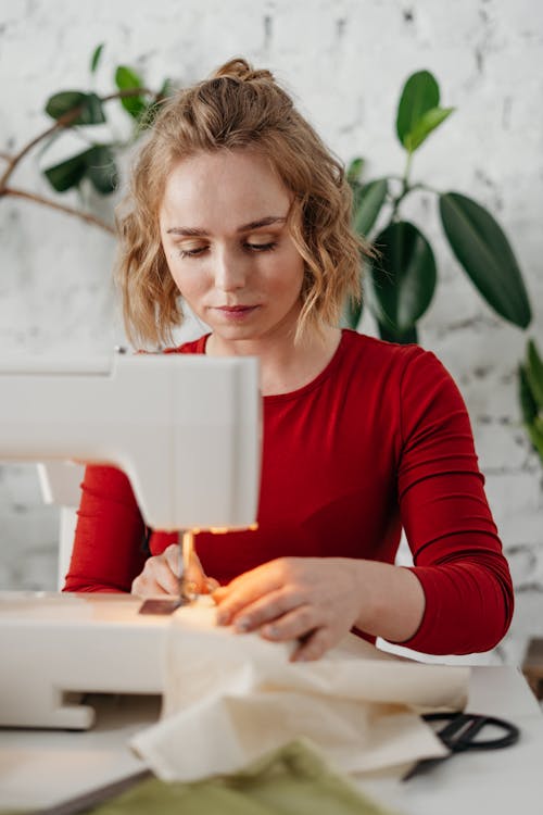 Woman Using a Sewing Machine