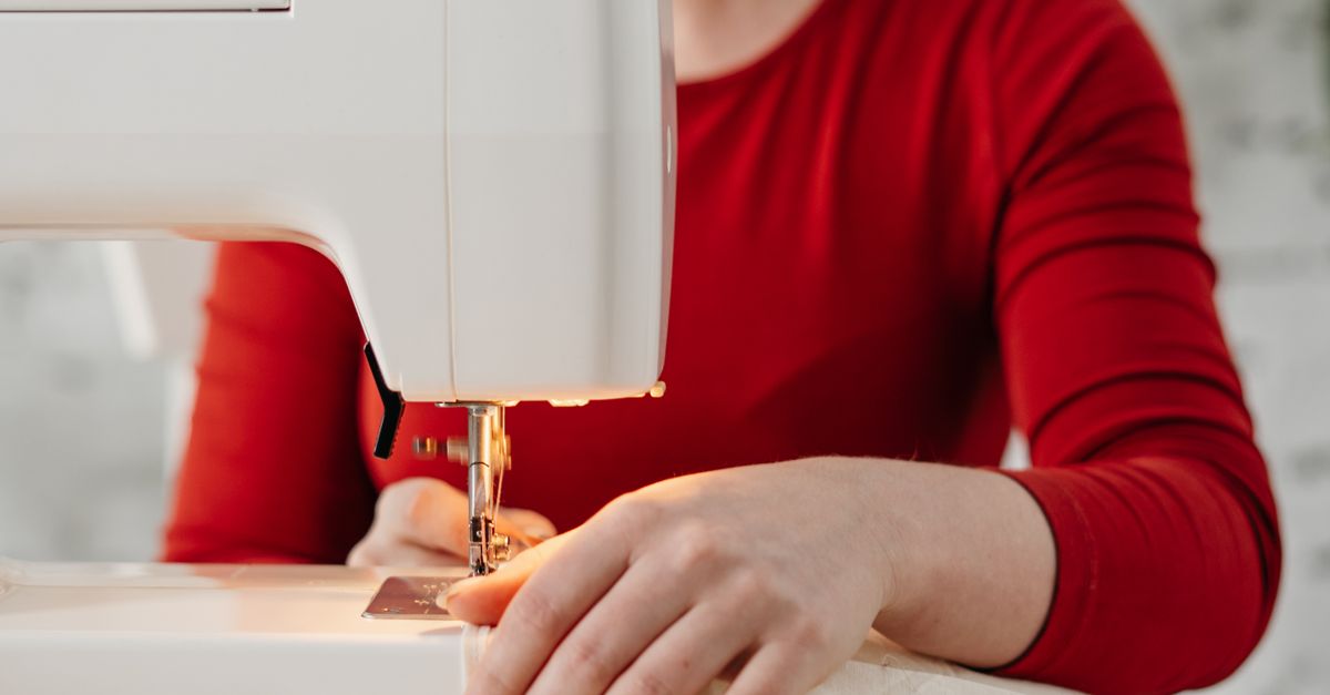 Photo of Woman Sewing · Free Stock Photo