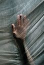 Persons Hand Holding Plastic