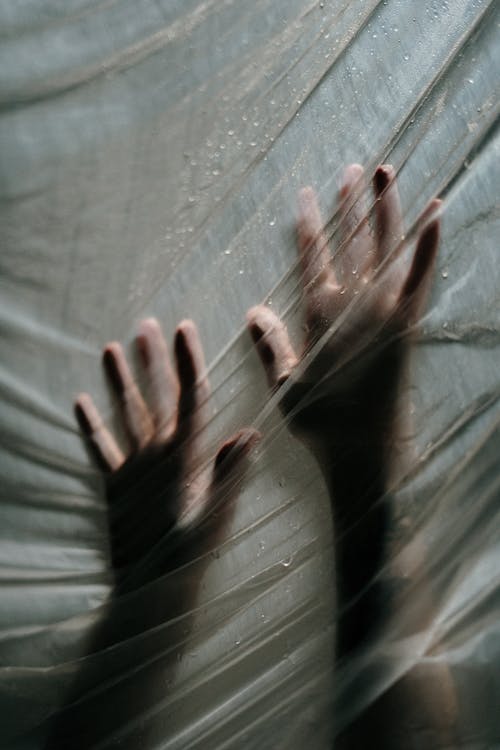 Personen Hand Auf Grauem Textil