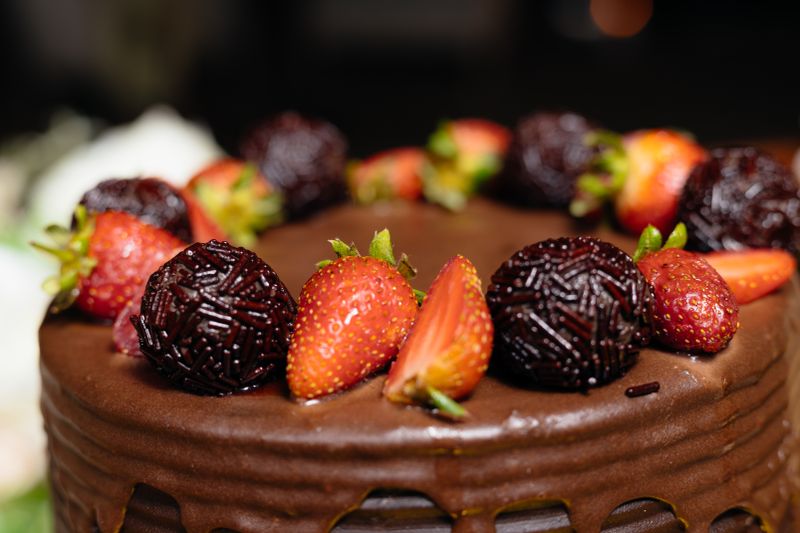 Rich chocolate ganache celebration cake with elegant decoration