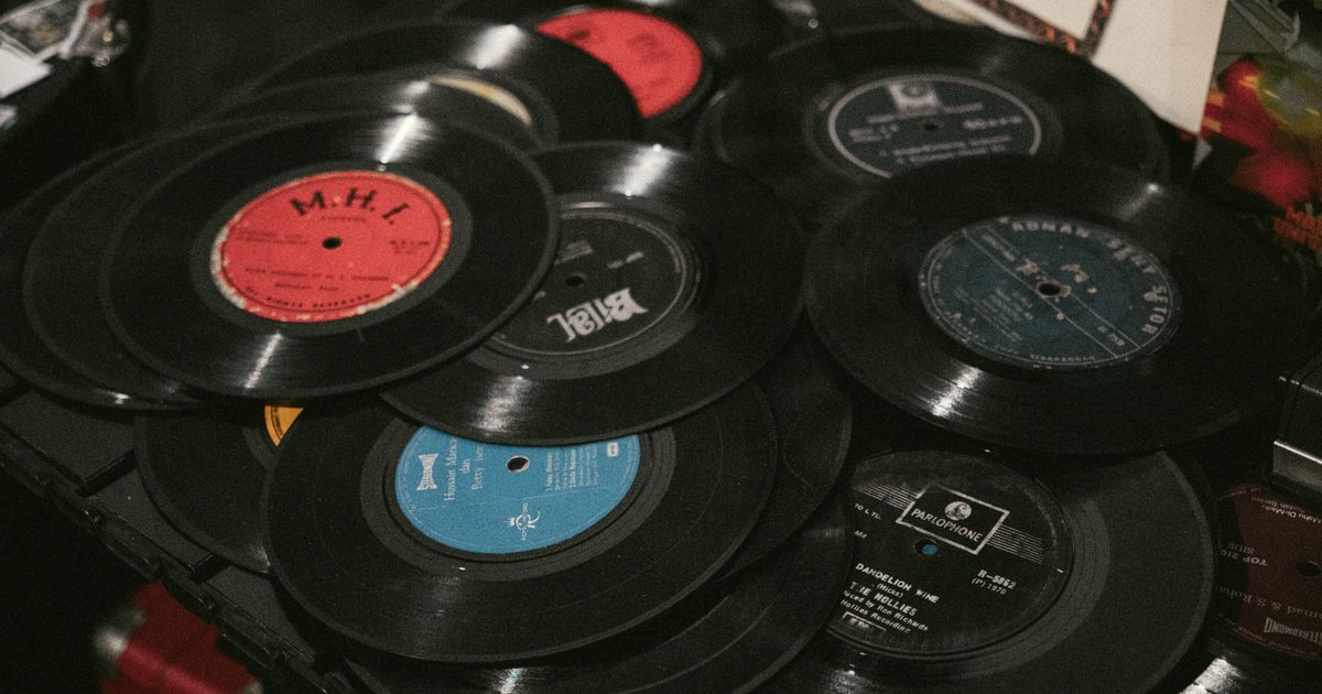 A vintage collection of vinyl records, showcasing iconic labels and retro aesthetics, perfect for music enthusiasts.