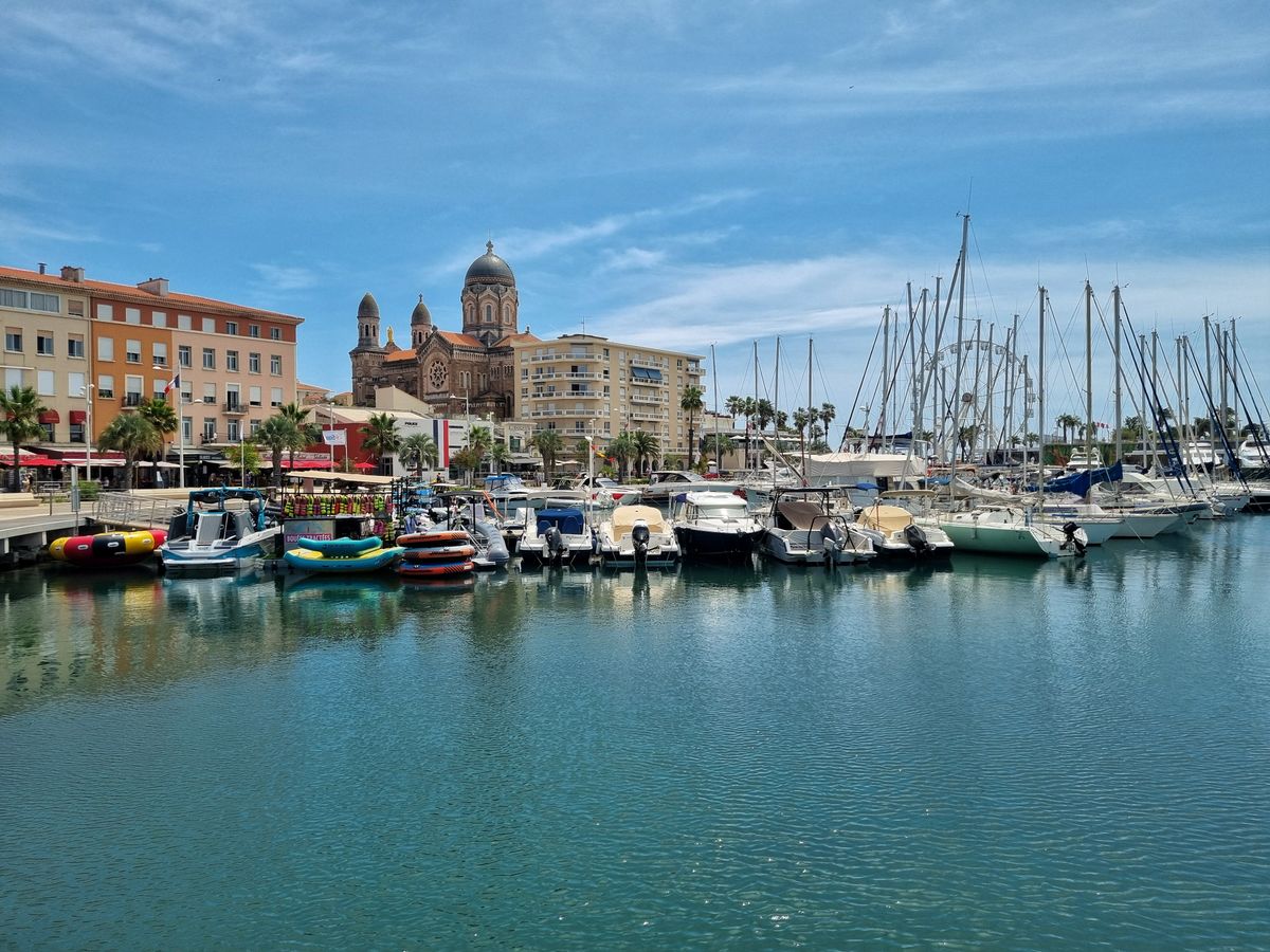 Saint-Tropez's old port and quayside, the destination for travellers who fly a private jet into Nice and continue by road or air