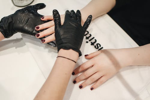Person Wearing Black Gloves