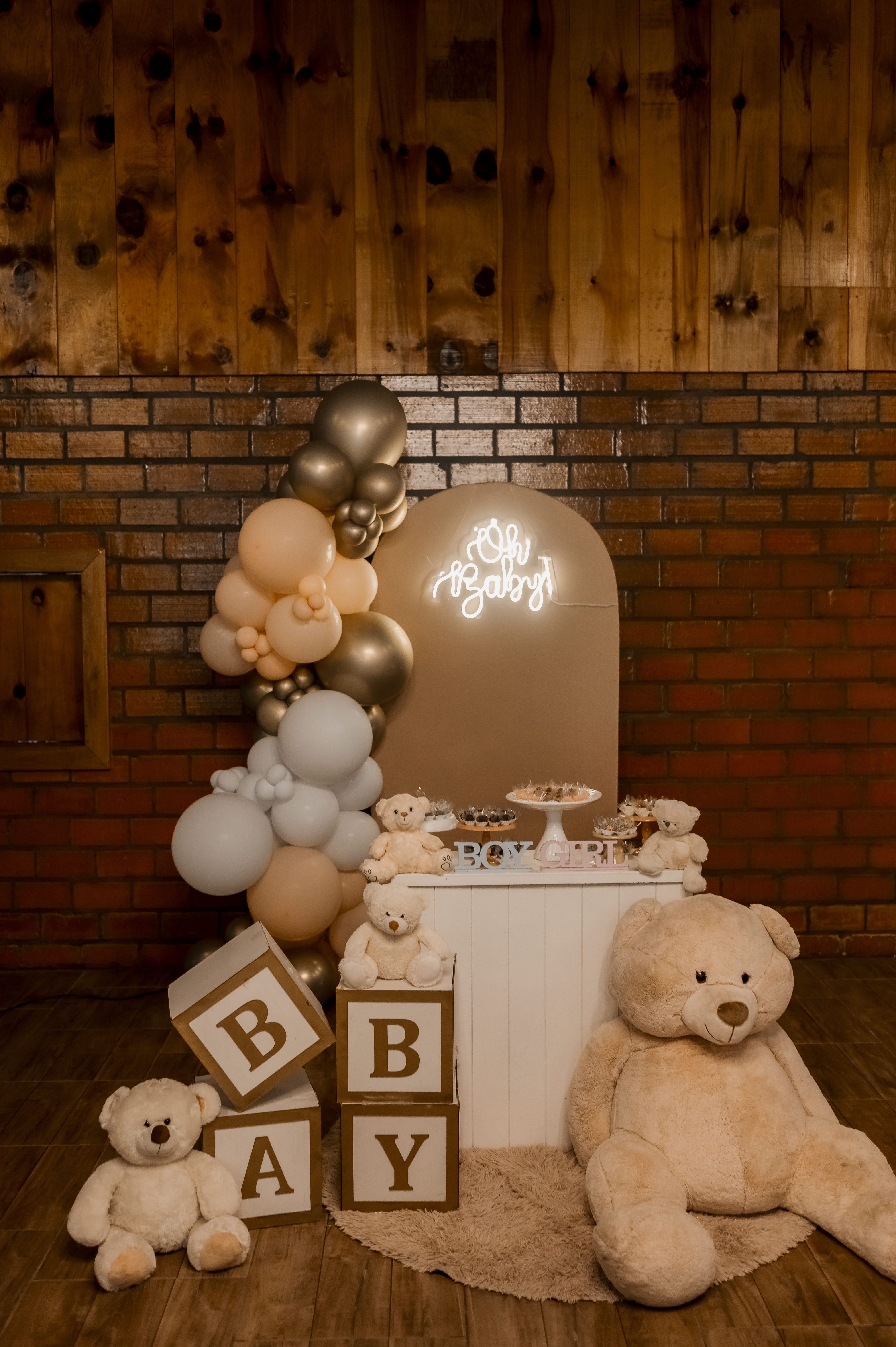 Baby shower setup with teddy bears and balloons