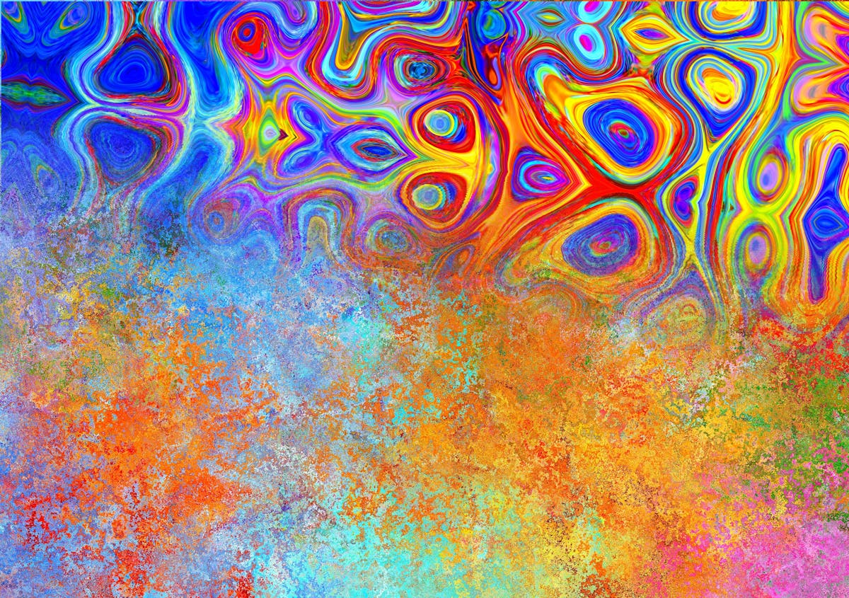 Green smoothie in a glass jar with straw and fresh spinach and banana around it