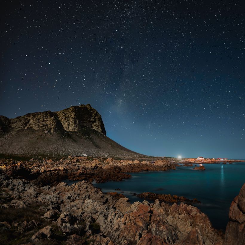 Cover art: night sky over a rocky shoreline — photo by Agnieszka Taggart on Pexels