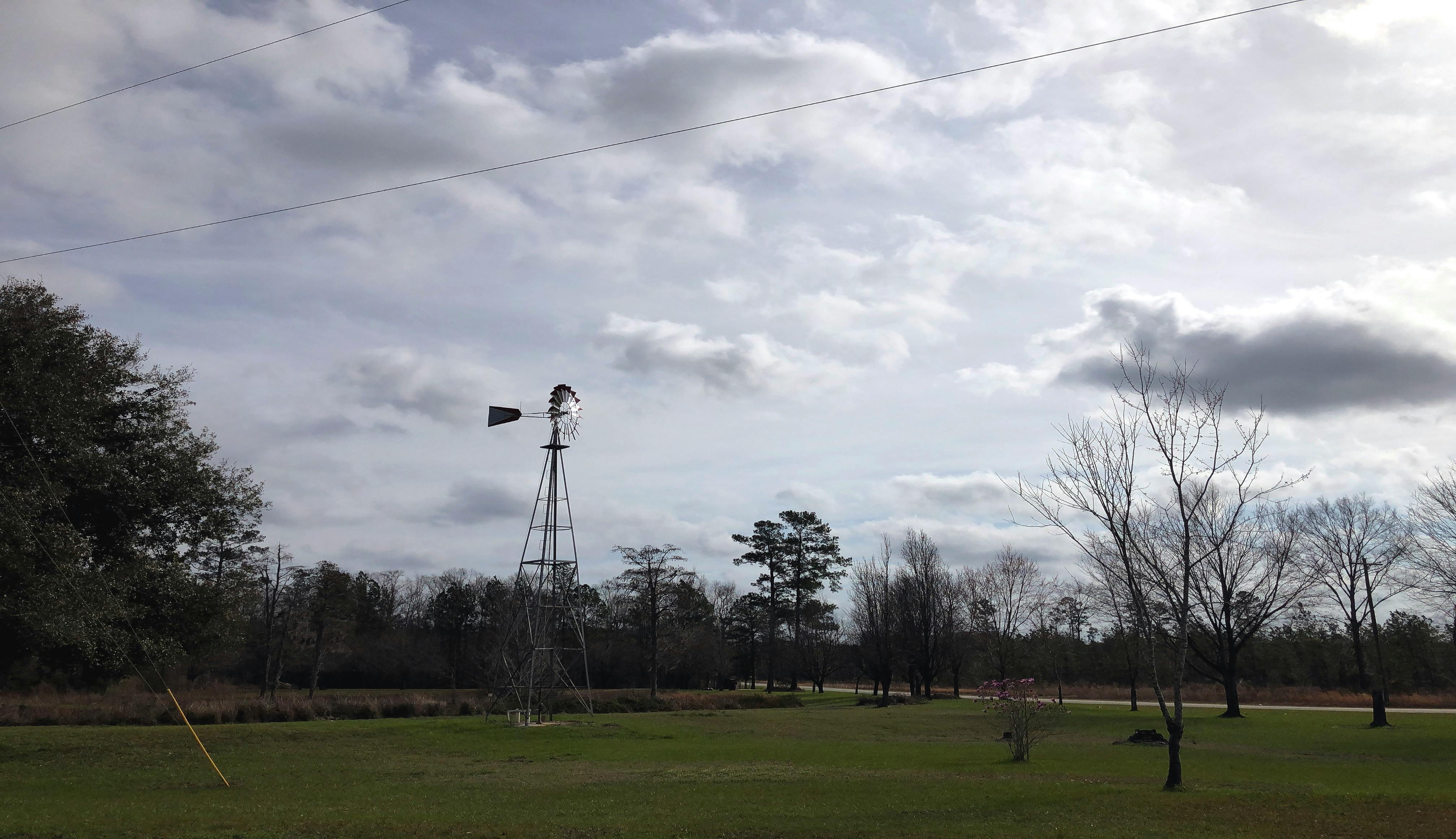 Healthy breakfast with juice, oatmeal, and fruit on a table