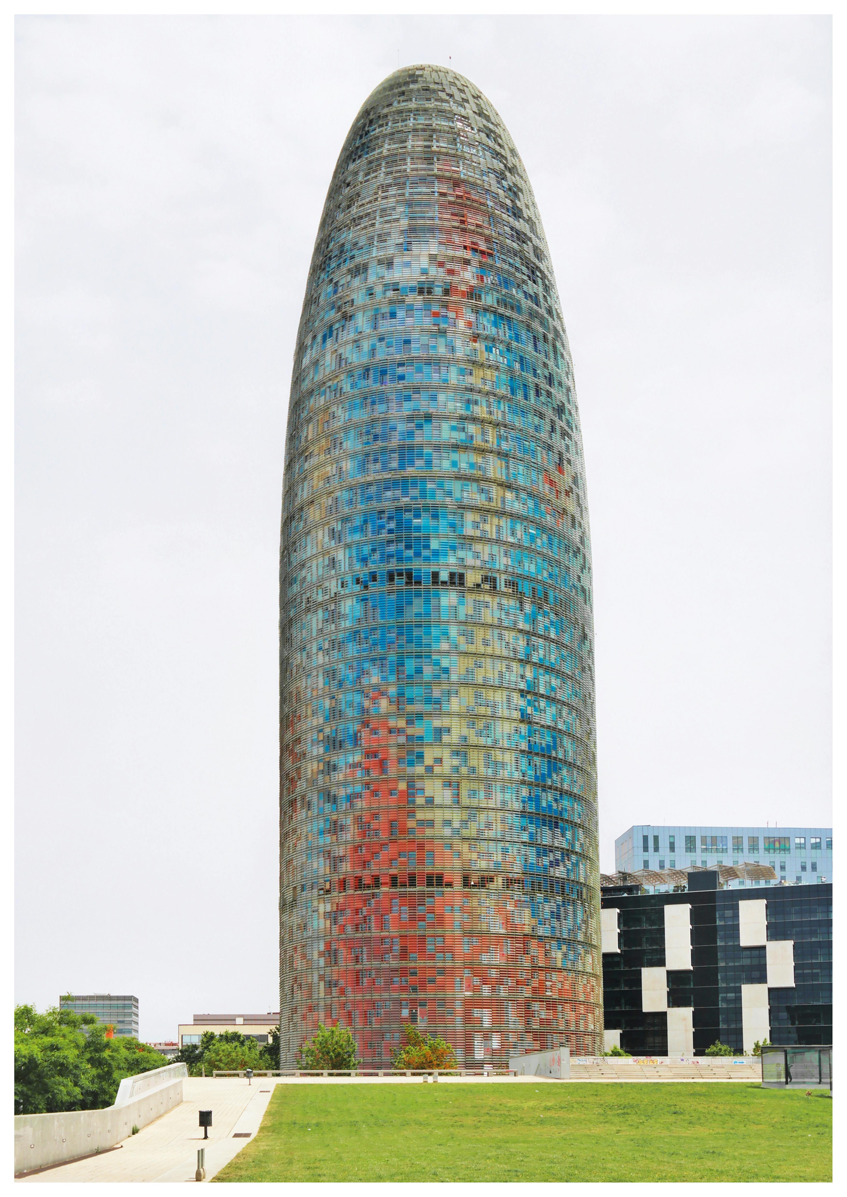 Person preparing overnight oats in glass jars