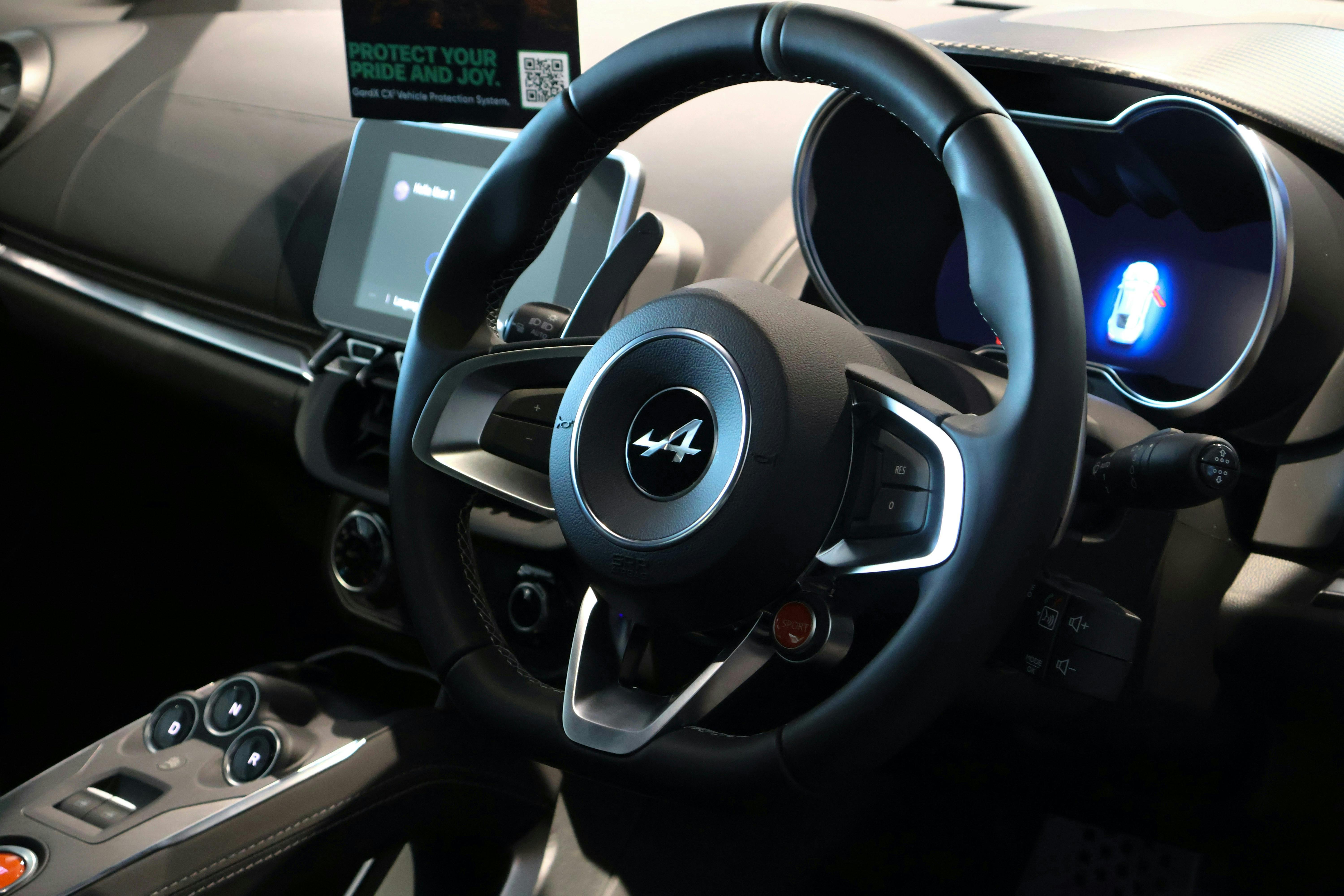 Luxurious interior of high-end supercar steering wheel representing Cristiano Ronaldo car collection