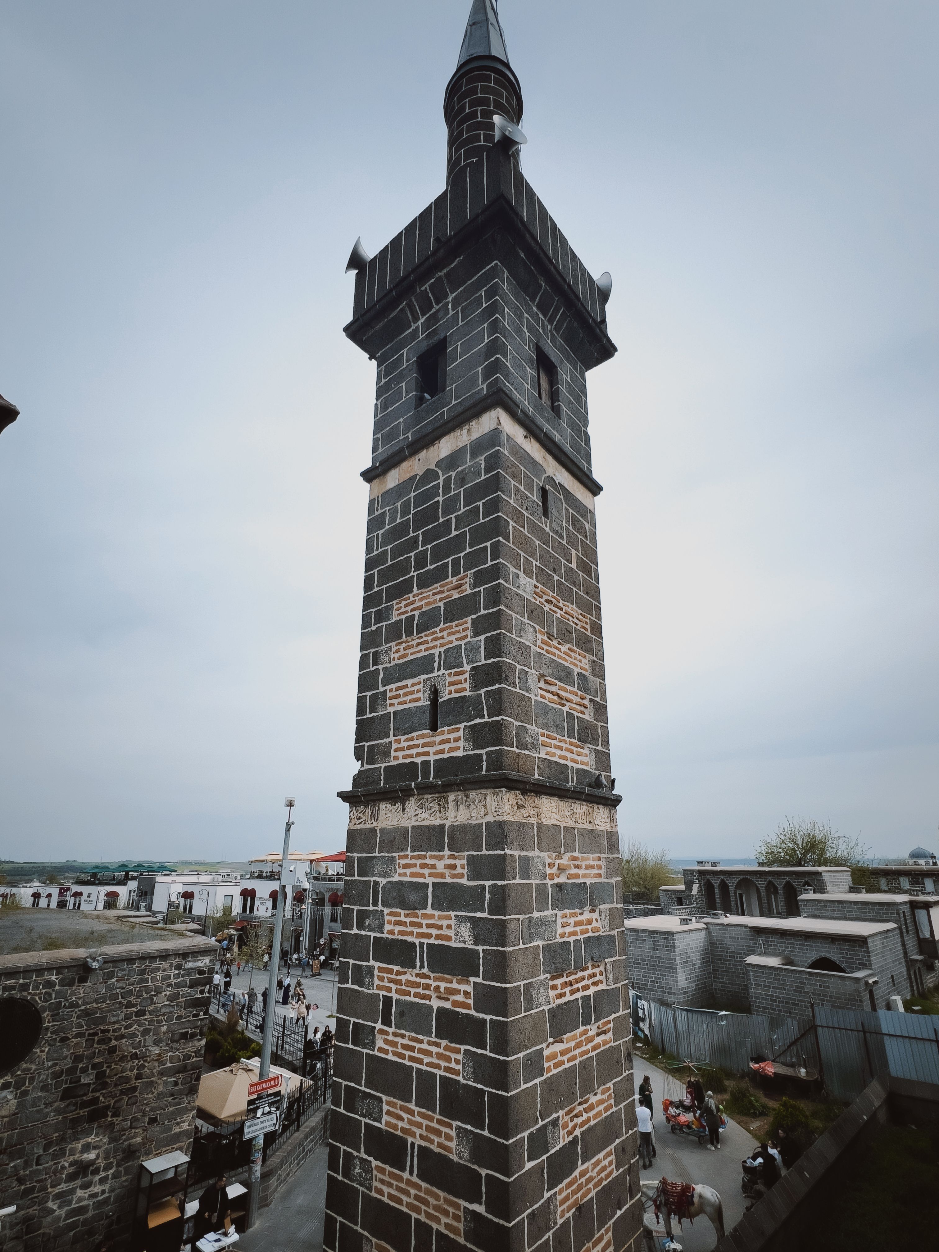 historic stone tower against cloudy sky