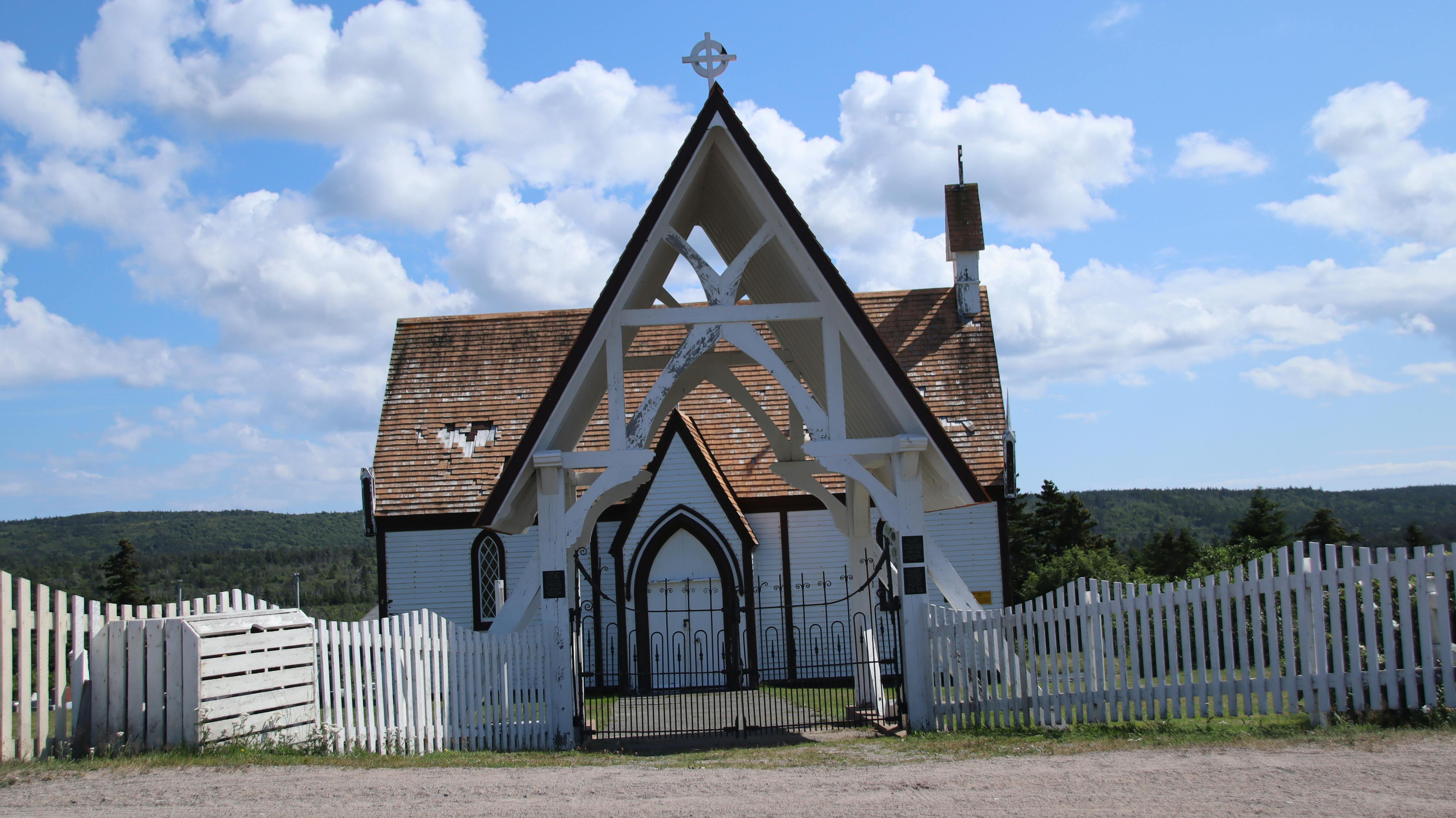 A cup of coffee with foam on top