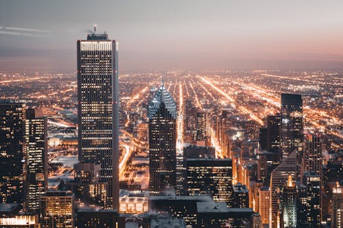 Gray High-rise Building at Night