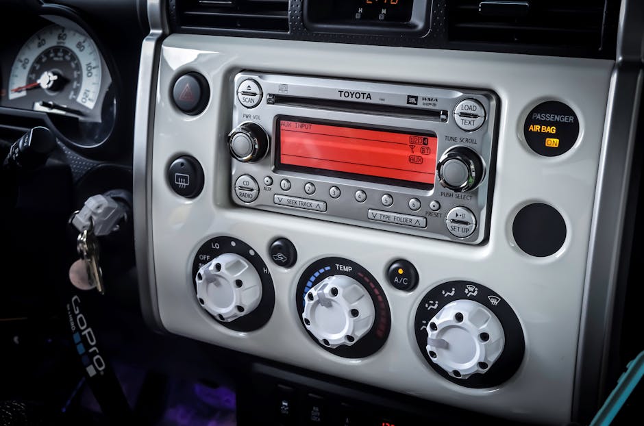 Detailed view of a car's dashboard, featuring a stereo system and control panel.