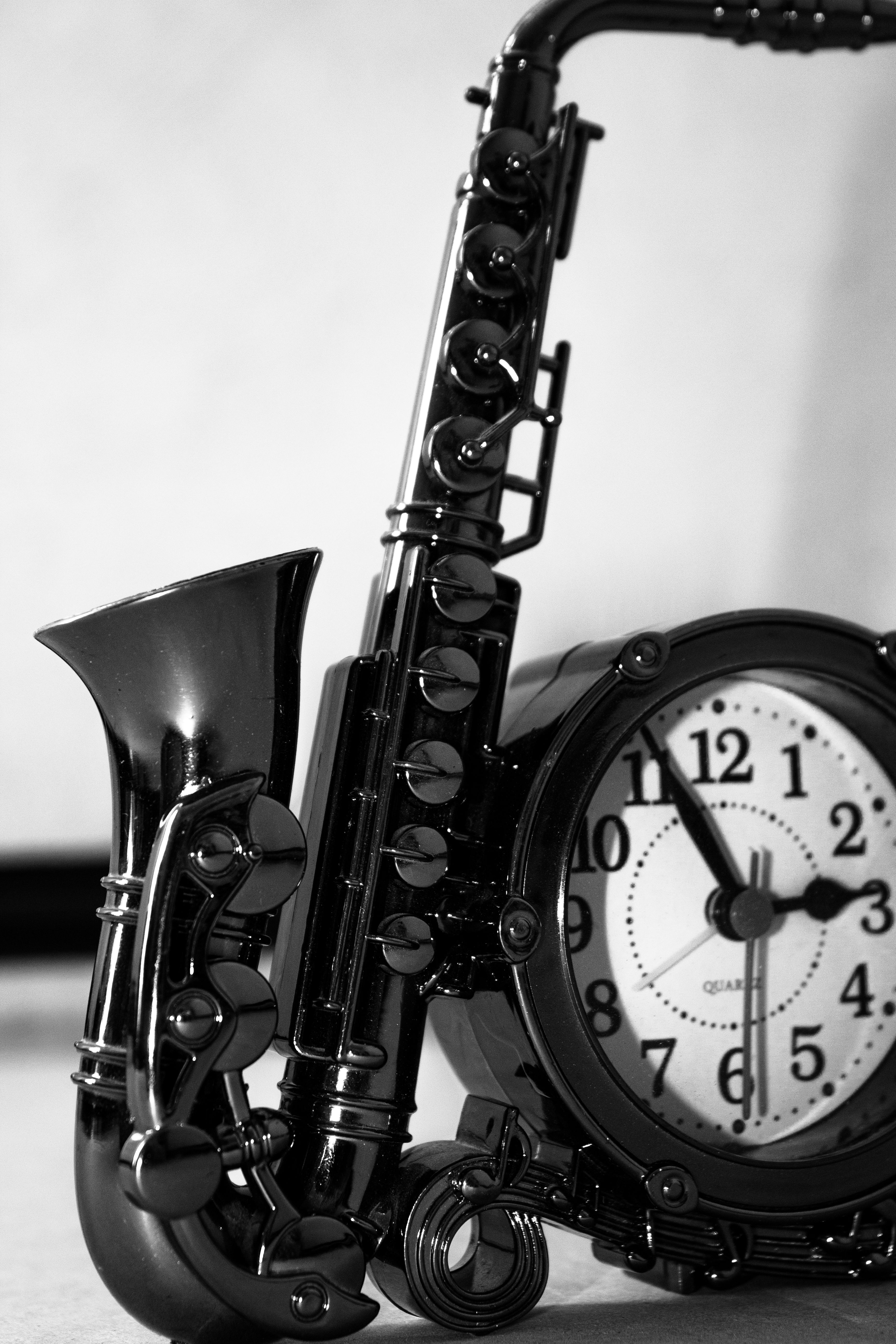 Black and White Saxophone-Shaped Clock · Free Stock Photo