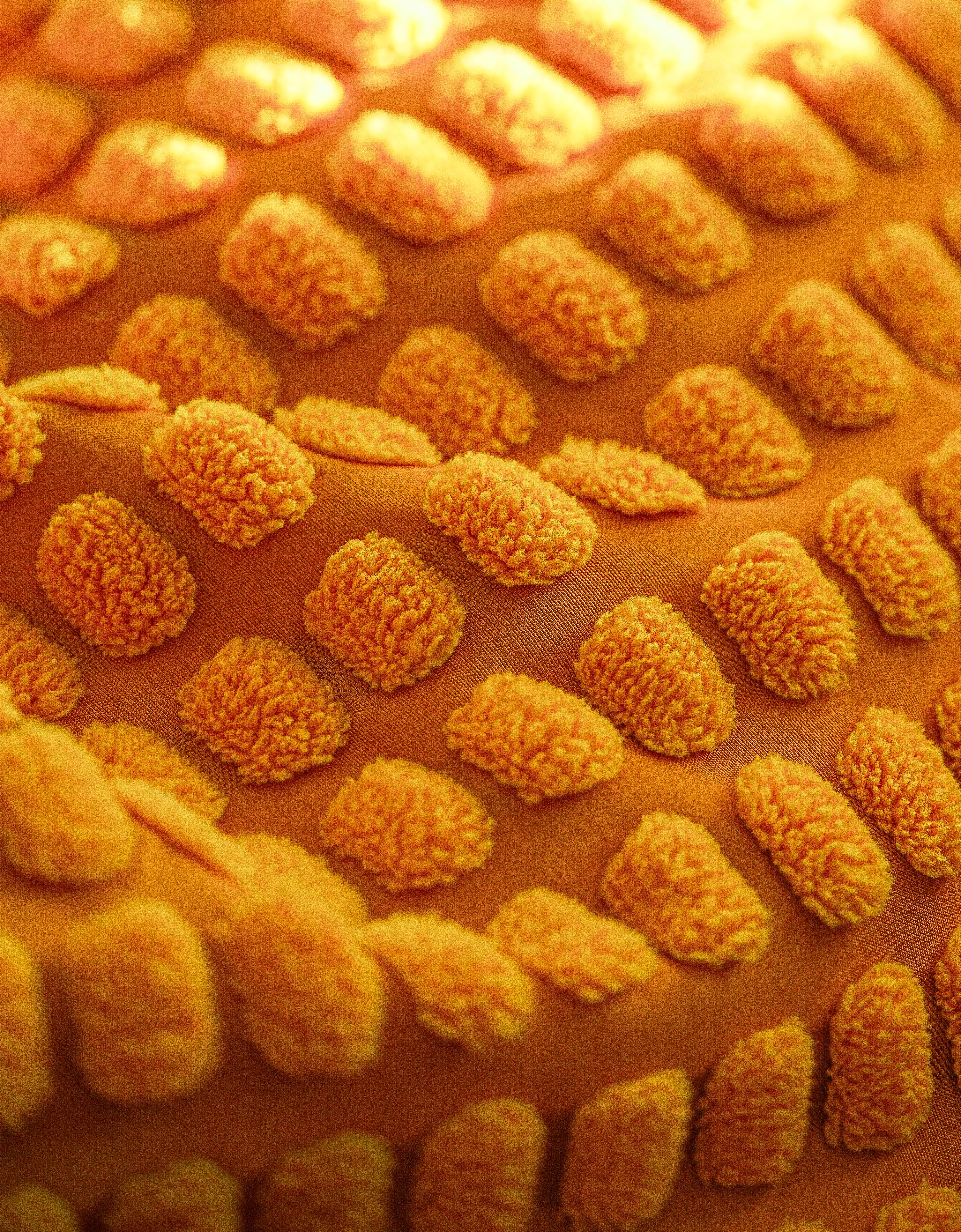 Close-Up of Textured Orange Fabric · Free Stock Photo