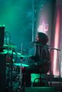 Man in Black Jacket Singing on Stage