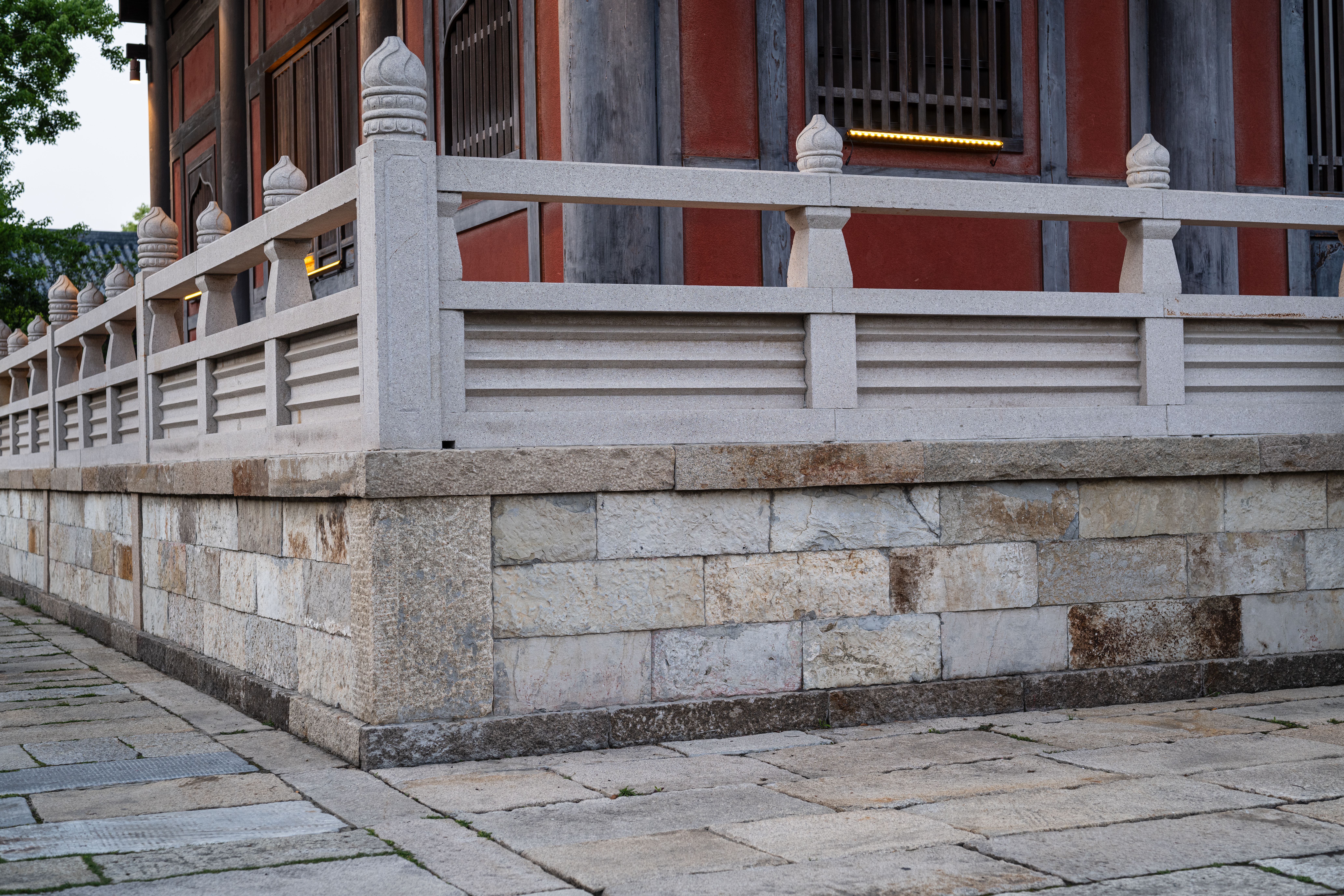 Stone patio and retaining wall construction