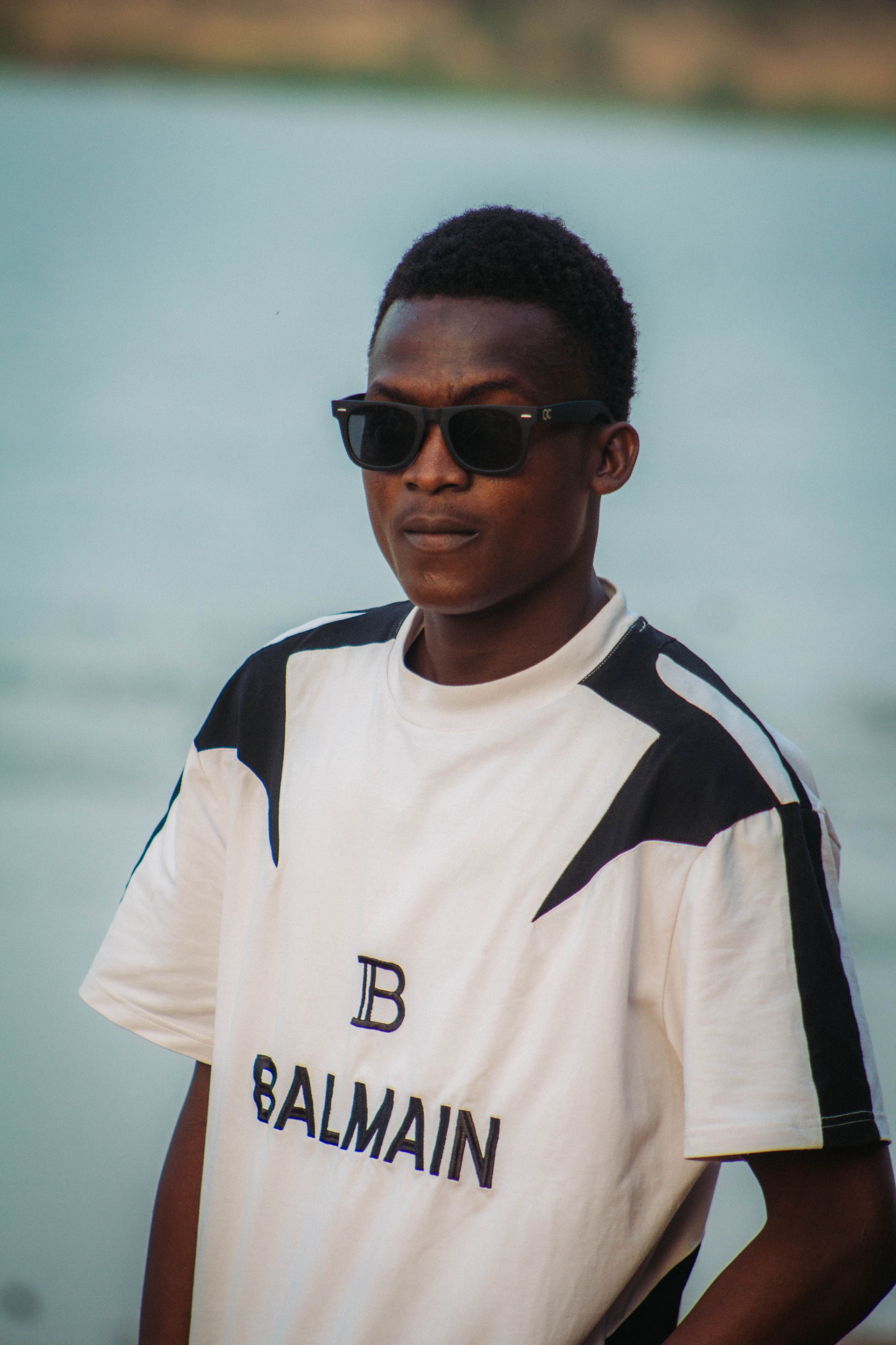 Portrait of Man Wearing Sunglasses by Water · Free Stock Photo