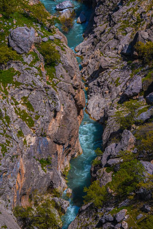Free A stunning aerial view of a rocky canyon with a flowing river in Kahta, Adiyaman, Türkiye. Stock Photo