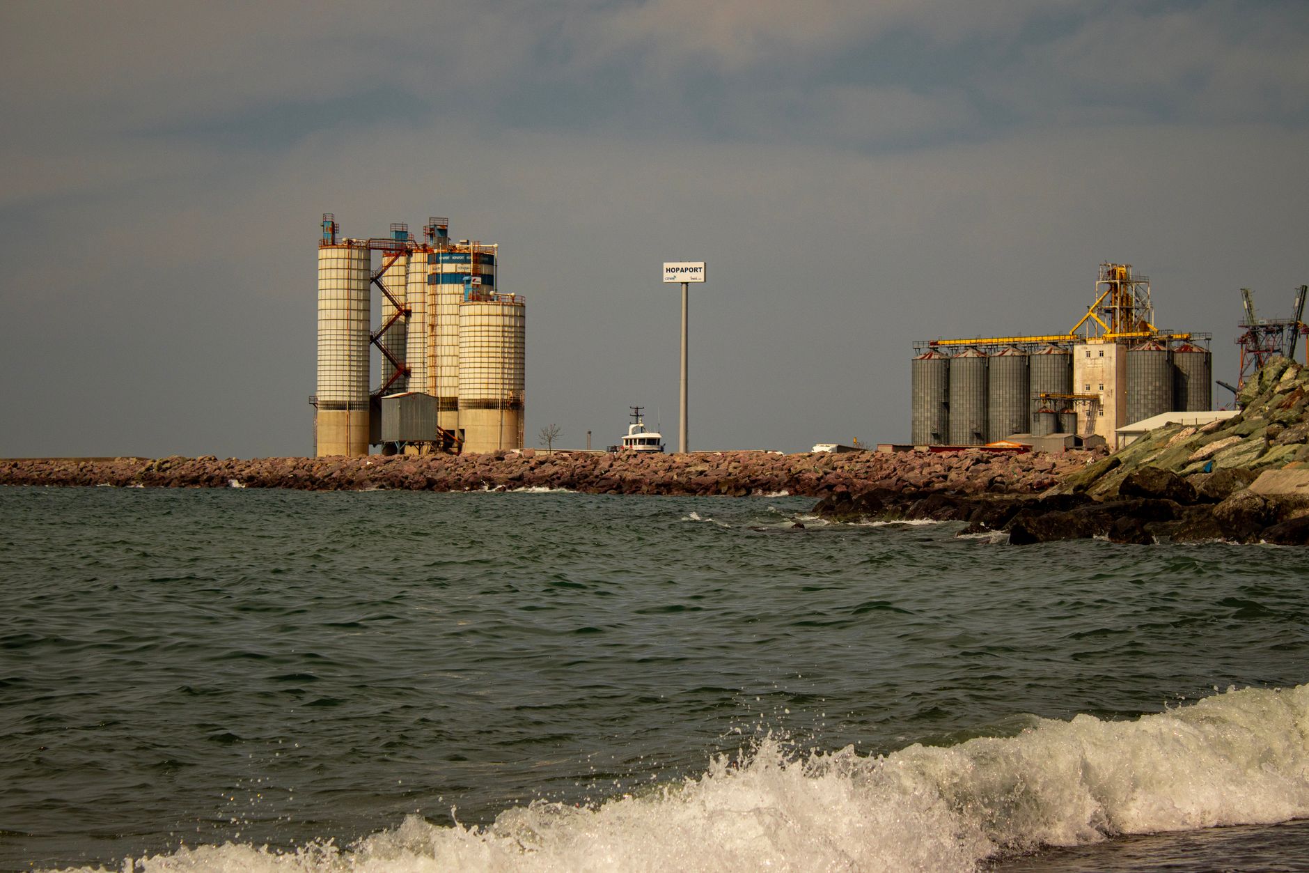 View of industrial port silos by the sea in Hopa, Artvin Province, Türkiye.