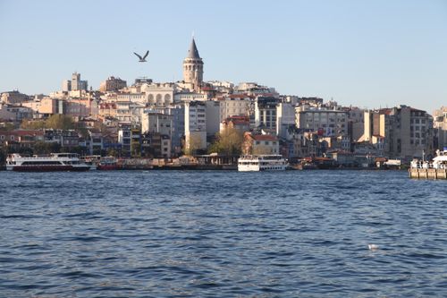Free Scenic view of Istanbul's Galata Tower with waterfront and urban skyline. Stock Photo