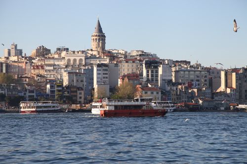 Free Scenic view of Galata Tower and Bosphorus in Istanbul with boats and seagulls. Stock Photo