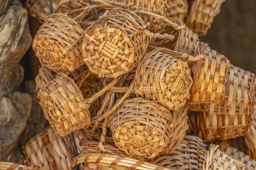 Detailed shot of handcrafted woven baskets showcasing intricate craftsmanship in Elche, Spain.